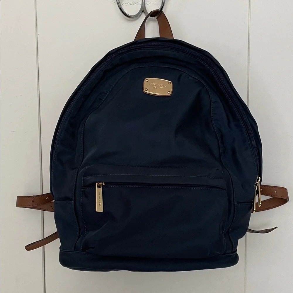 Elegant Michael Kors Navy and Tan Backpack